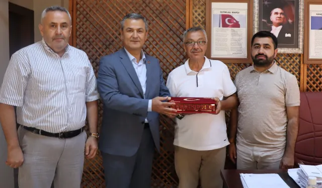 İzmit'te muhtarlara doğum günü ziyareti
